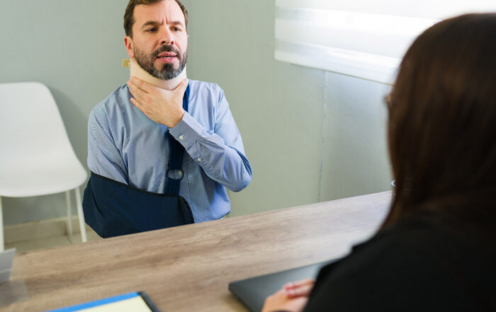 Lawyer discussing personal injury case types with a client