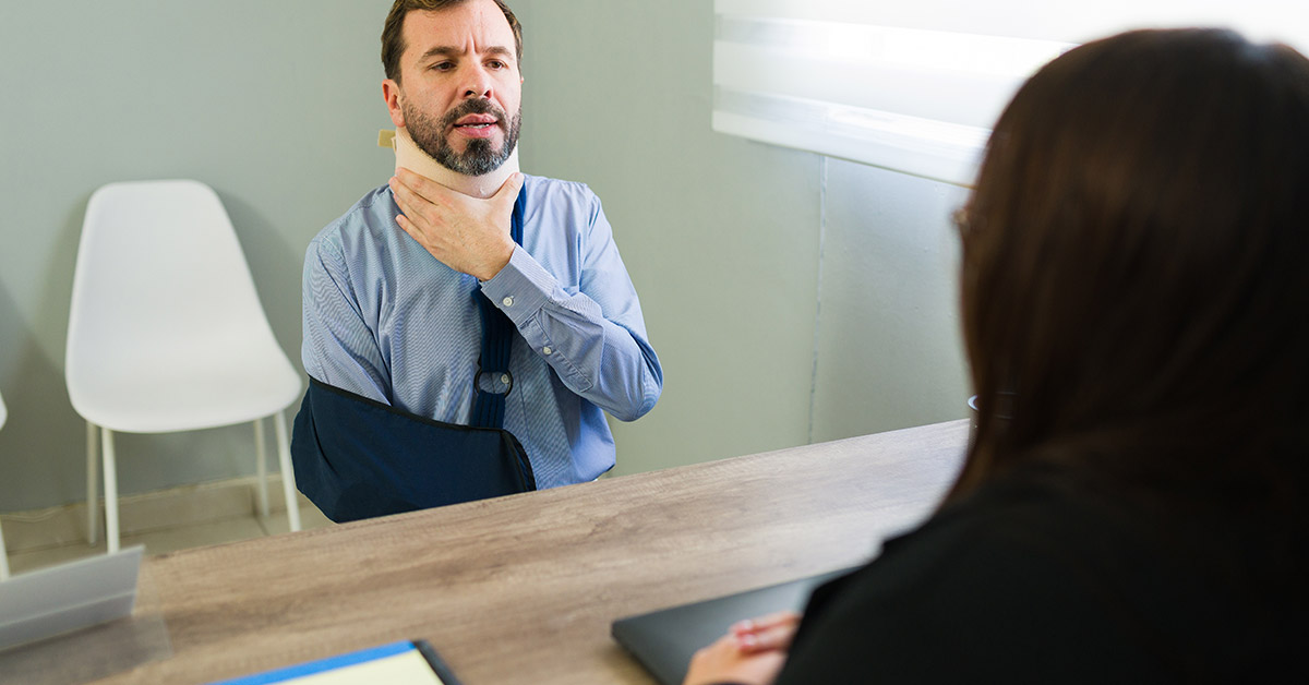 Lawyer discussing personal injury case types with a client
