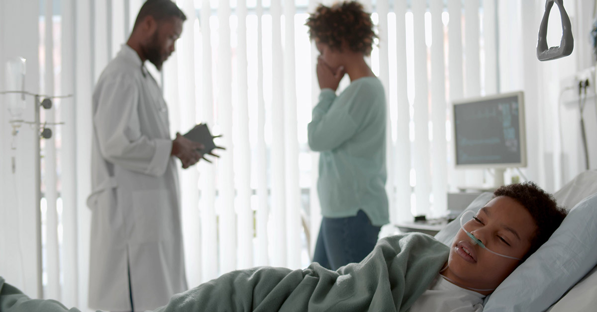 Child receiving medical care after a serious toy-related injury that may cause permanent brain damage.